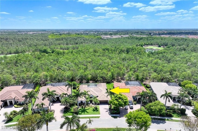 aerial view with a view of trees and a residential view