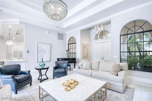 living room with visible vents, a notable chandelier, ornamental molding, recessed lighting, and light tile patterned flooring