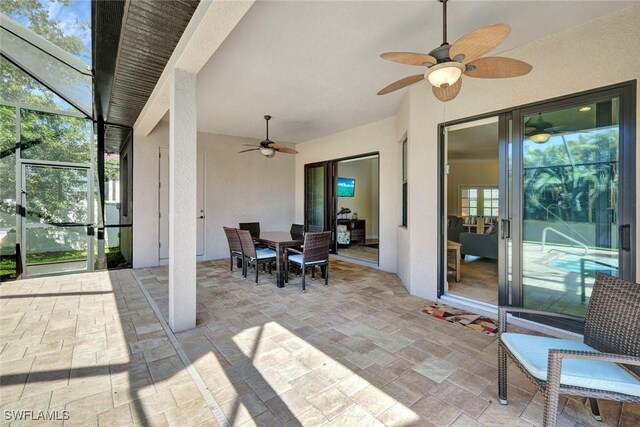 view of patio / terrace featuring a ceiling fan and outdoor dining area