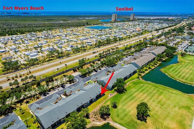 12130 Kelly Greens Blvd Unit 91, Fort Myers, FL 33908 - aerial view with a water view, a residential view, and view of golf course