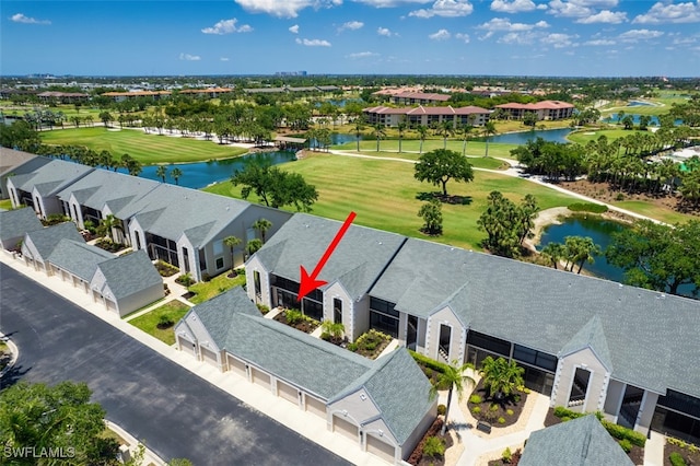 12130 Kelly Greens Blvd Unit 91, Fort Myers, FL 33908 - drone / aerial view featuring golf course view, a water view, and a residential view