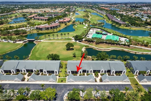 12130 Kelly Greens Blvd Unit 91, Fort Myers, FL 33908 - drone / aerial view featuring view of golf course, a water view, and a residential view