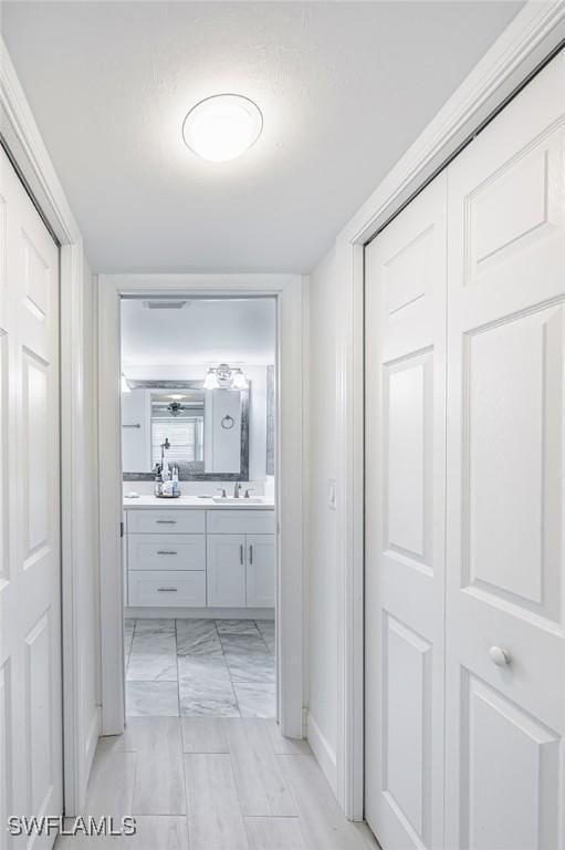 12130 Kelly Greens Blvd Unit 91, Fort Myers, FL 33908 - corridor with marble finish floor