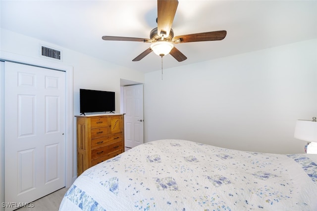 12130 Kelly Greens Blvd Unit 91, Fort Myers, FL 33908 - bedroom featuring ceiling fan, light wood finished floors, and visible vents