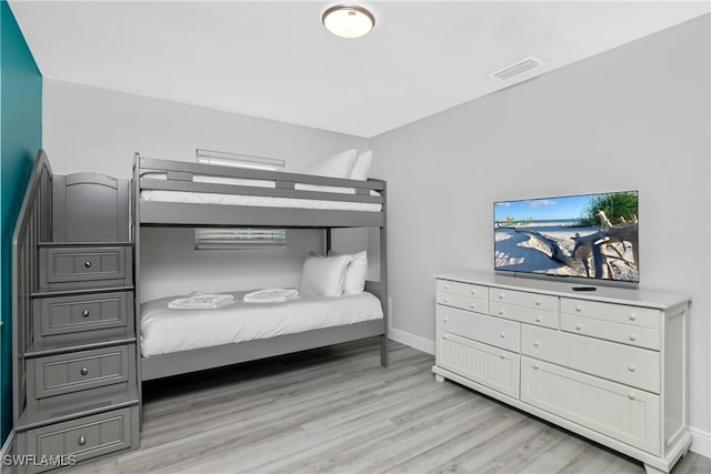 7666 Laurel Valley Rd, Fort Myers, FL 33967 - bedroom featuring light wood finished floors and baseboards