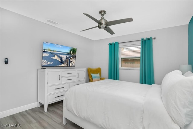 7666 Laurel Valley Rd, Fort Myers, FL 33967 - bedroom featuring light wood-type flooring, baseboards, and ceiling fan