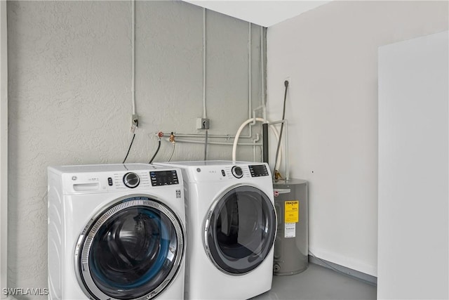 7666 Laurel Valley Rd, Fort Myers, FL 33967 - clothes washing area with water heater and washing machine and clothes dryer
