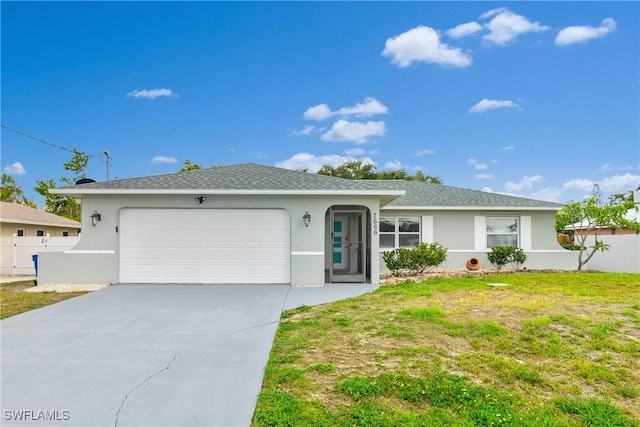 7666 Laurel Valley Rd, Fort Myers, FL 33967 - ranch-style house featuring driveway, an attached garage, and stucco siding