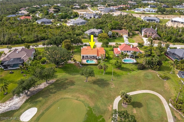 aerial view featuring a residential view and golf course view