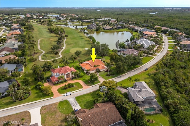 aerial view featuring a residential view and a water view