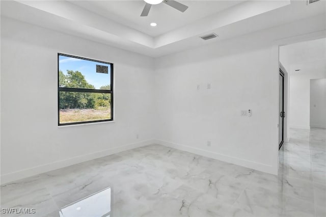 3518 50th St W, Lehigh Acres, FL 33971 - empty room with baseboards, marble finish floor, and visible vents