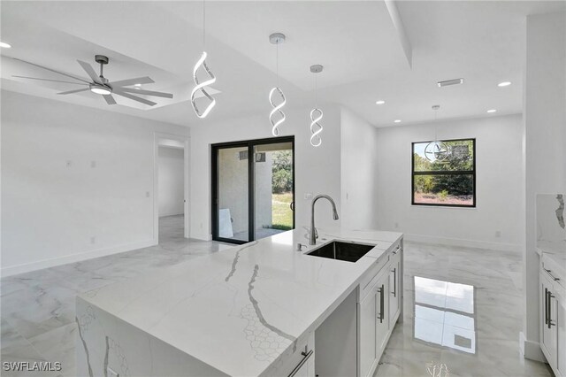 3518 50th St W, Lehigh Acres, FL 33971 - kitchen featuring a sink, white cabinets, recessed lighting, and open floor plan