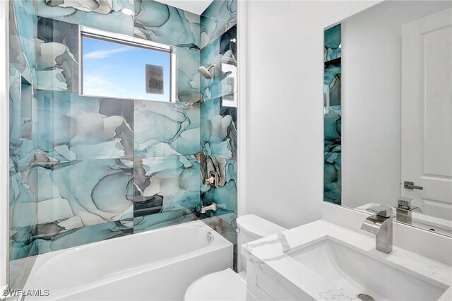 3518 50th St W, Lehigh Acres, FL 33971 - bathroom featuring vanity, toilet, and bathing tub / shower combination