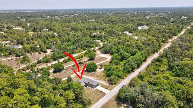 3518 50th St W, Lehigh Acres, FL 33971 - bird's eye view featuring a view of trees