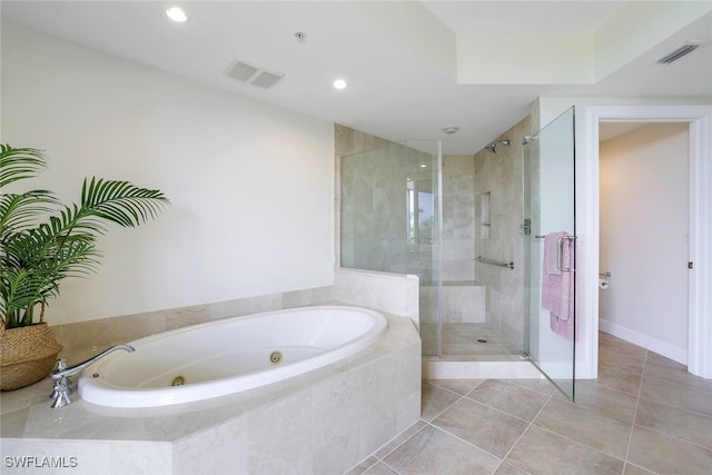 1050 Borghese Ln Unit 206, Naples, FL 34114 - full bathroom with a tub with jets, a shower stall, tile patterned floors, recessed lighting, and baseboards