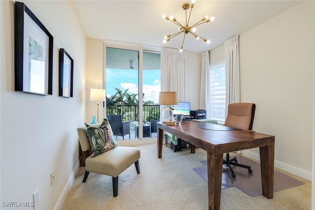 1050 Borghese Ln Unit 206, Naples, FL 34114 - home office featuring a chandelier, a wall of windows, baseboards, and light carpet