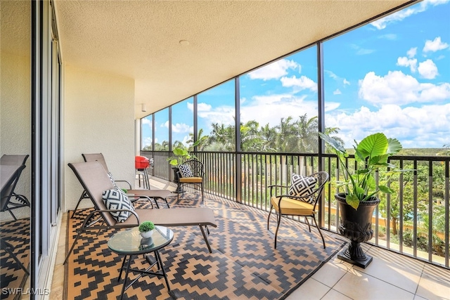 1050 Borghese Ln Unit 206, Naples, FL 34114 - sunroom featuring plenty of natural light