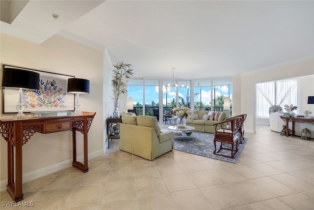 1050 Borghese Ln Unit 206, Naples, FL 34114 - living room featuring ornamental molding, baseboards, light tile patterned floors, and a chandelier