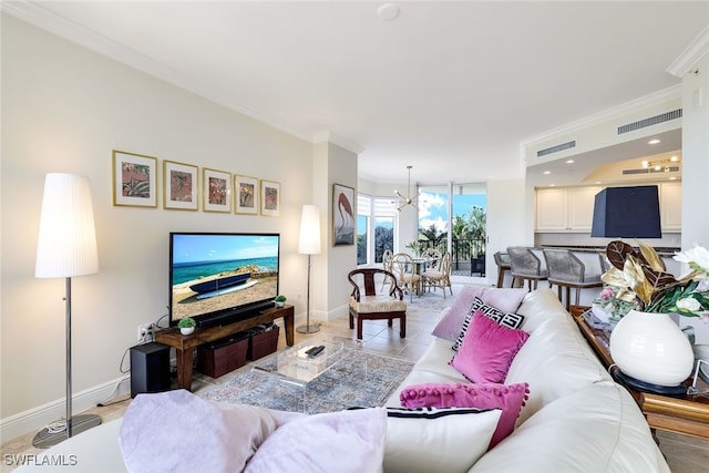 1050 Borghese Ln Unit 206, Naples, FL 34114 - living area featuring ornamental molding, baseboards, and a chandelier