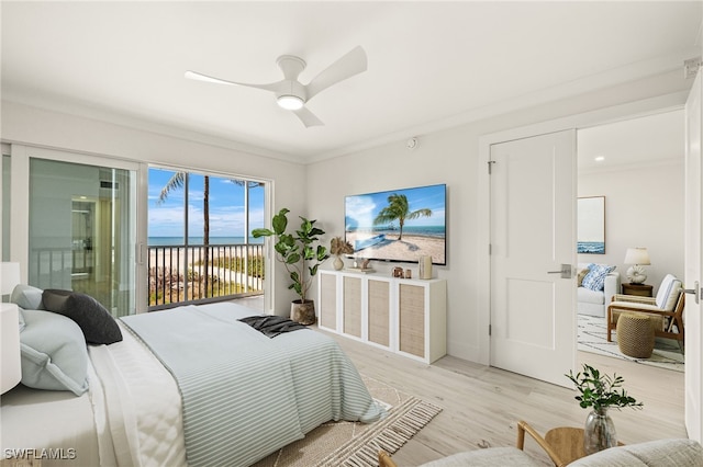 bedroom featuring a ceiling fan, light wood-style floors, access to outside, and baseboards