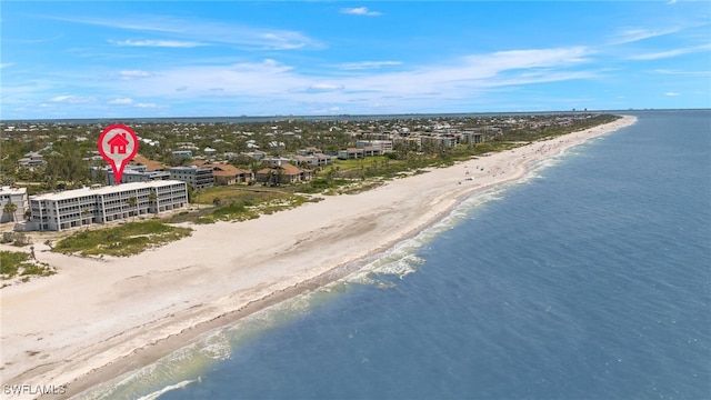 aerial view featuring a water view and a view of the beach