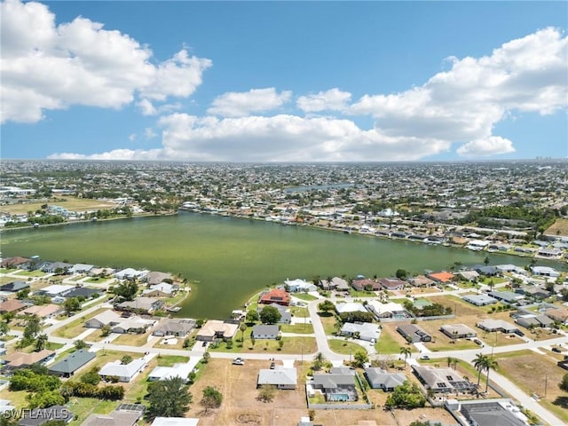 914 SW 3rd Ave, Cape Coral, FL 33991 - aerial view of property and surrounding area with nearby suburban area and a nearby body of water