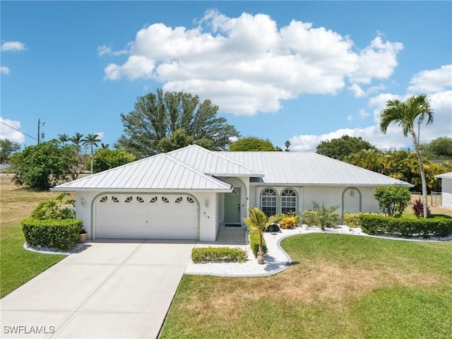 914 SW 3rd Ave, Cape Coral, FL 33991 - single story home featuring stucco siding, a garage, and a front lawn