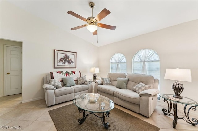 914 SW 3rd Ave, Cape Coral, FL 33991 - living area with lofted ceiling, light tile patterned floors, a ceiling fan, and baseboards