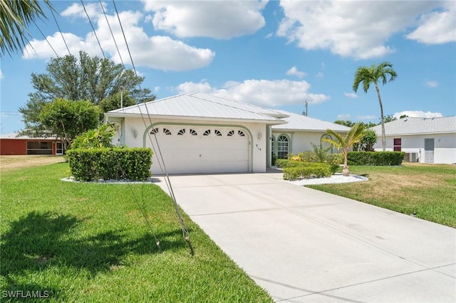 914 SW 3rd Ave, Cape Coral, FL 33991 - ranch-style house with stucco siding, concrete driveway, an attached garage, and a front lawn