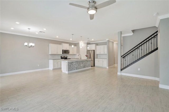 unfurnished living room featuring crown molding, recessed lighting, baseboards, and ceiling fan with notable chandelier