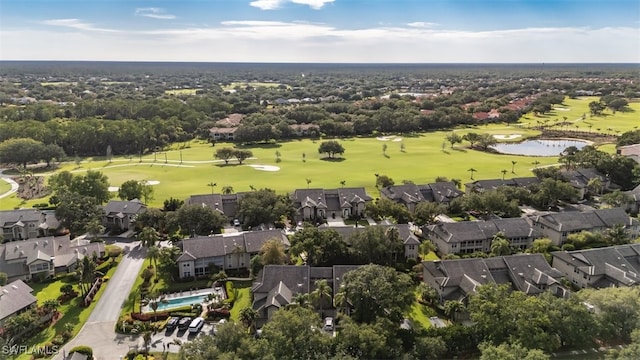birds eye view of property with a water view, golf course view, and a residential view