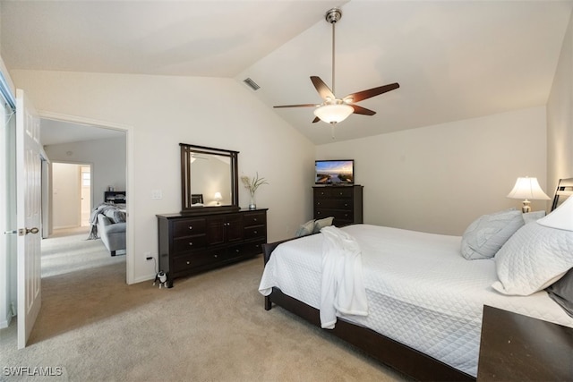 bedroom featuring lofted ceiling, a ceiling fan, visible vents, and light colored carpet