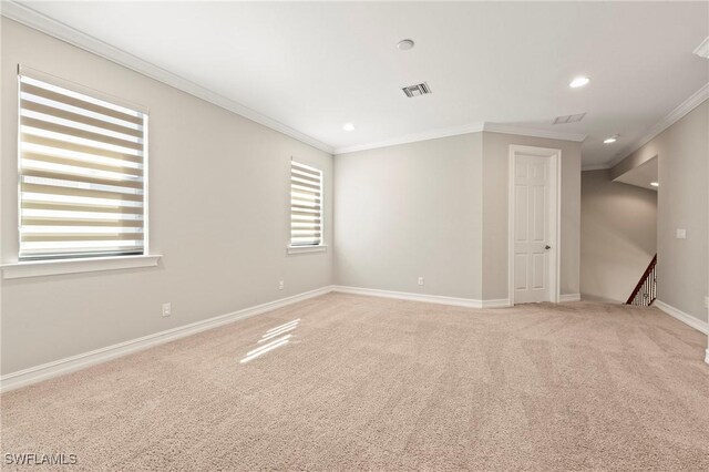 14351 Tuscany Pointe Trl, Naples, FL 34120 - unfurnished room with visible vents, recessed lighting, crown molding, light carpet, and baseboards