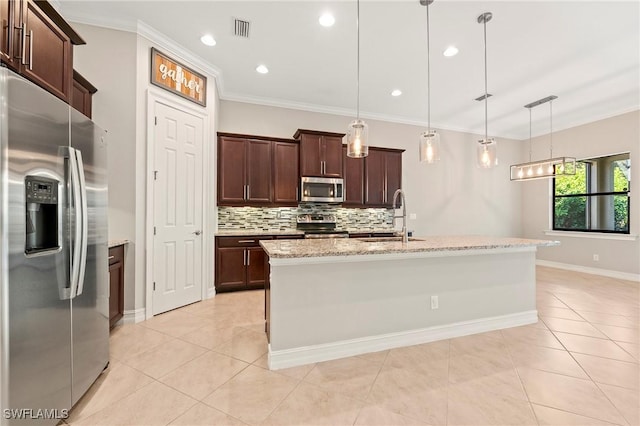 kitchen featuring visible vents, crown molding, a sink, appliances with stainless steel finishes, and backsplash