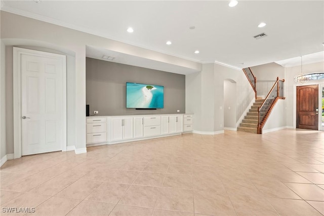 unfurnished living room with visible vents, light tile patterned floors, and stairway
