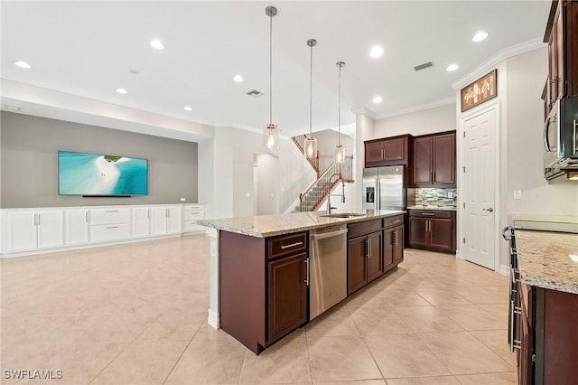 kitchen featuring visible vents, ornamental molding, decorative backsplash, dark brown cabinets, and appliances with stainless steel finishes