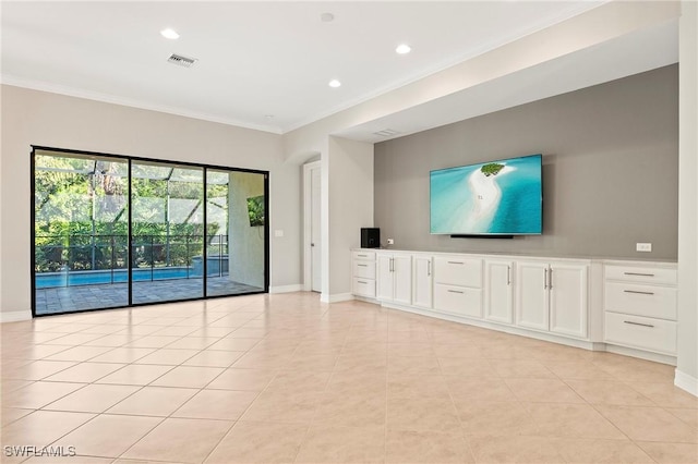 unfurnished living room with light tile patterned floors, baseboards, ornamental molding, and recessed lighting