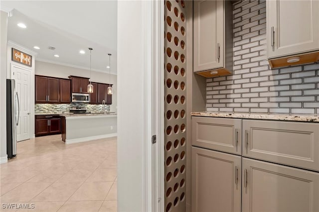 kitchen with crown molding, stainless steel appliances, recessed lighting, light tile patterned floors, and backsplash