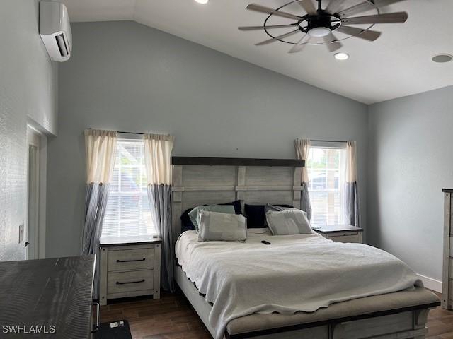 7834 15th Pl, Labelle, FL 33935 - bedroom featuring dark wood-style flooring, a wall mounted AC, recessed lighting, and lofted ceiling