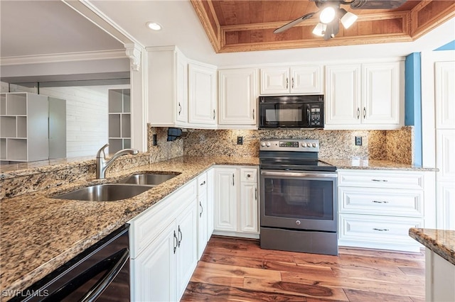 kitchen with a sink, ceiling fan, black appliances, and white cabinets