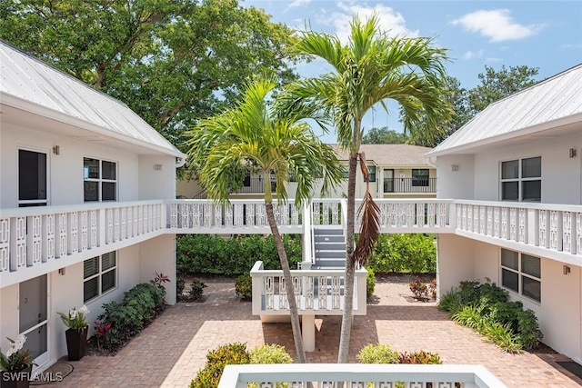 780 10th Ave S Unit 23, Naples, FL 34102 - view of community featuring stairs