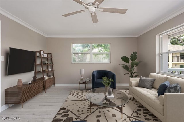 780 10th Ave S Unit 23, Naples, FL 34102 - living room featuring crown molding, baseboards, a ceiling fan, and light wood finished floors