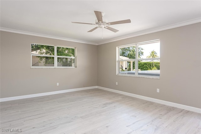 780 10th Ave S Unit 23, Naples, FL 34102 - unfurnished room with crown molding, ceiling fan, baseboards, and light wood-type flooring