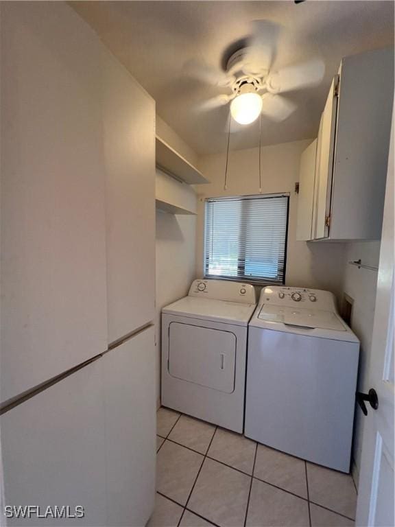 1016 SE 46th St Unit 102, Cape Coral, FL 33904 - clothes washing area featuring cabinet space, independent washer and dryer, and light tile patterned floors
