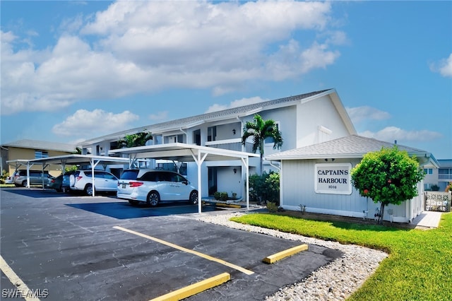 1016 SE 46th St Unit 102, Cape Coral, FL 33904 - view of partially covered parking lot