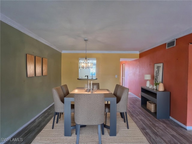1016 SE 46th St Unit 102, Cape Coral, FL 33904 - dining area featuring baseboards, wood finished floors, and visible vents