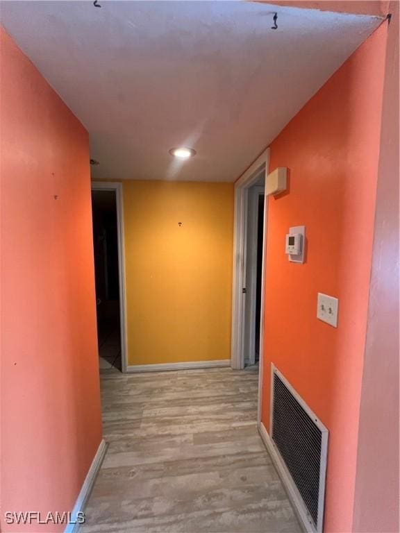 1016 SE 46th St Unit 102, Cape Coral, FL 33904 - corridor featuring visible vents, recessed lighting, baseboards, and wood finished floors