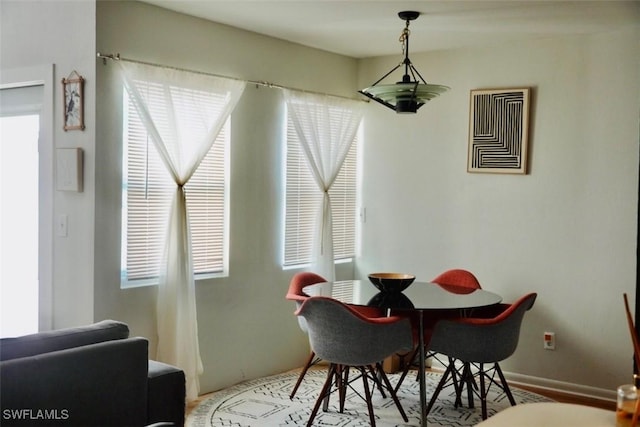 6053 Timberwood Cir Unit 233, Fort Myers, FL 33908 - dining area with visible vents and a wealth of natural light