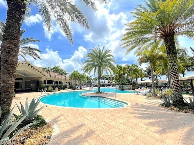 community pool with a patio
