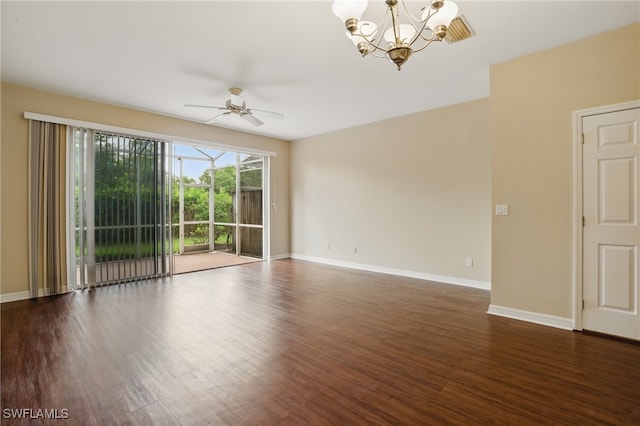 8310 Village Edge Cir Unit 3, Fort Myers, FL 33919 - unfurnished room featuring dark wood-type flooring, baseboards, and ceiling fan with notable chandelier